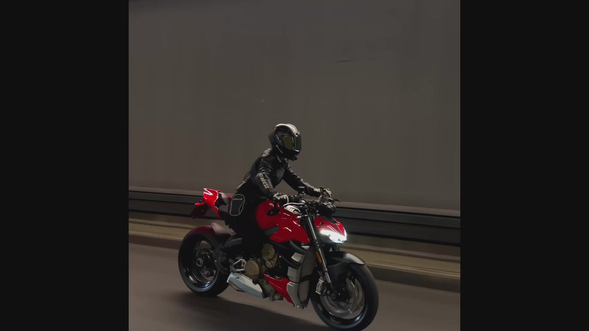 Load video: Motorcycle rider in motion - RyderCases motorsport inspired carbon fiber cases